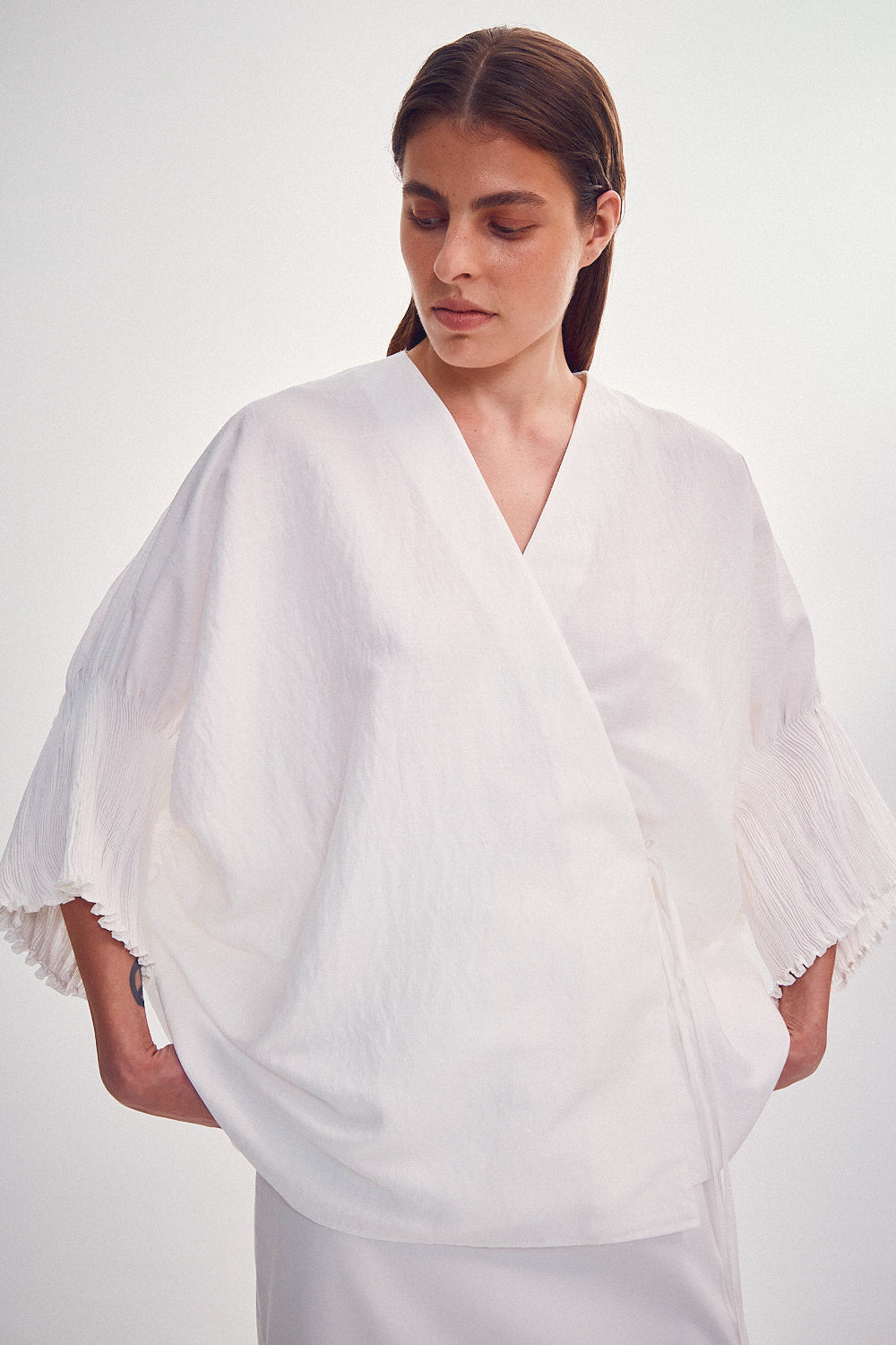 Blouse with tight sleeves