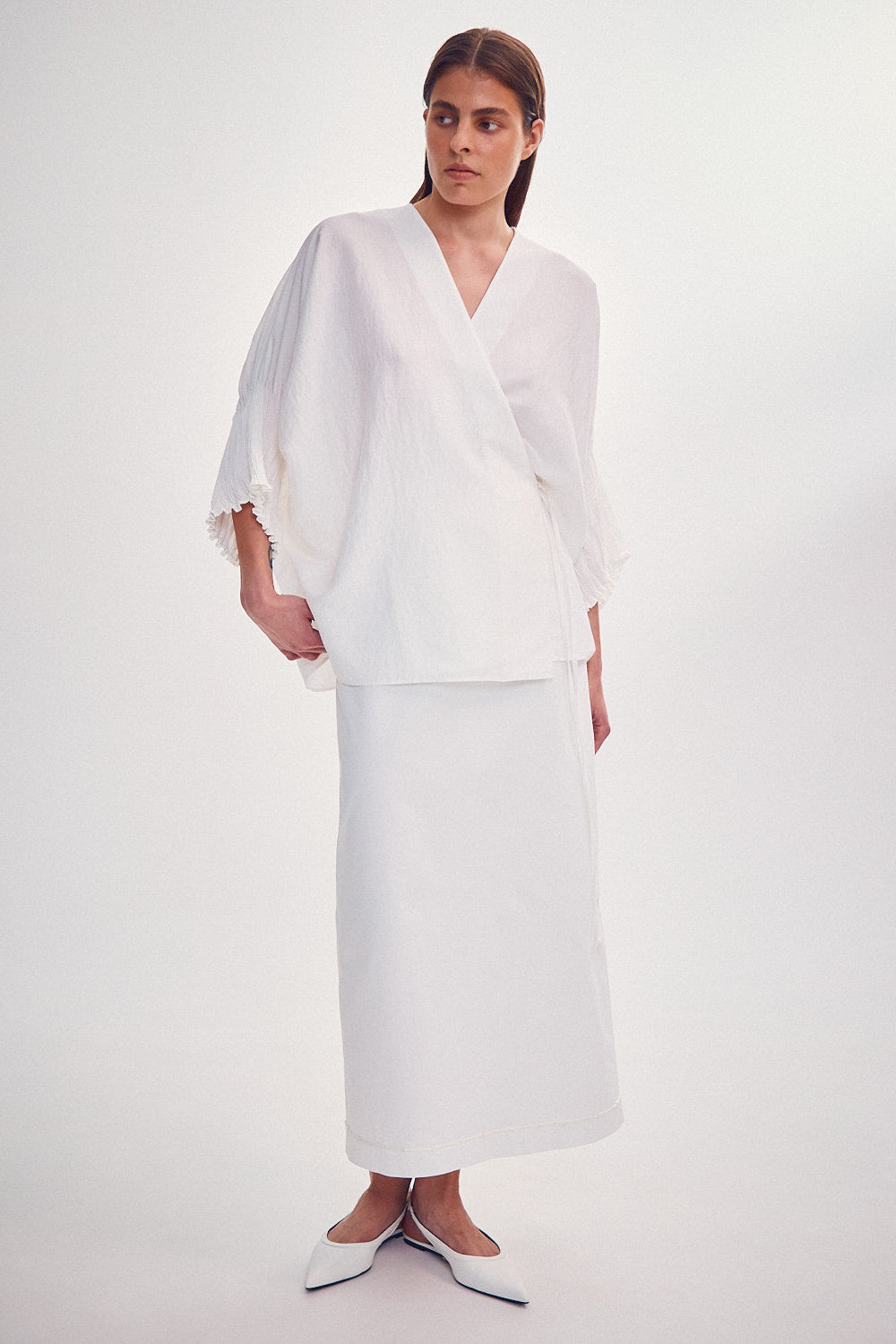 Blouse with tight sleeves