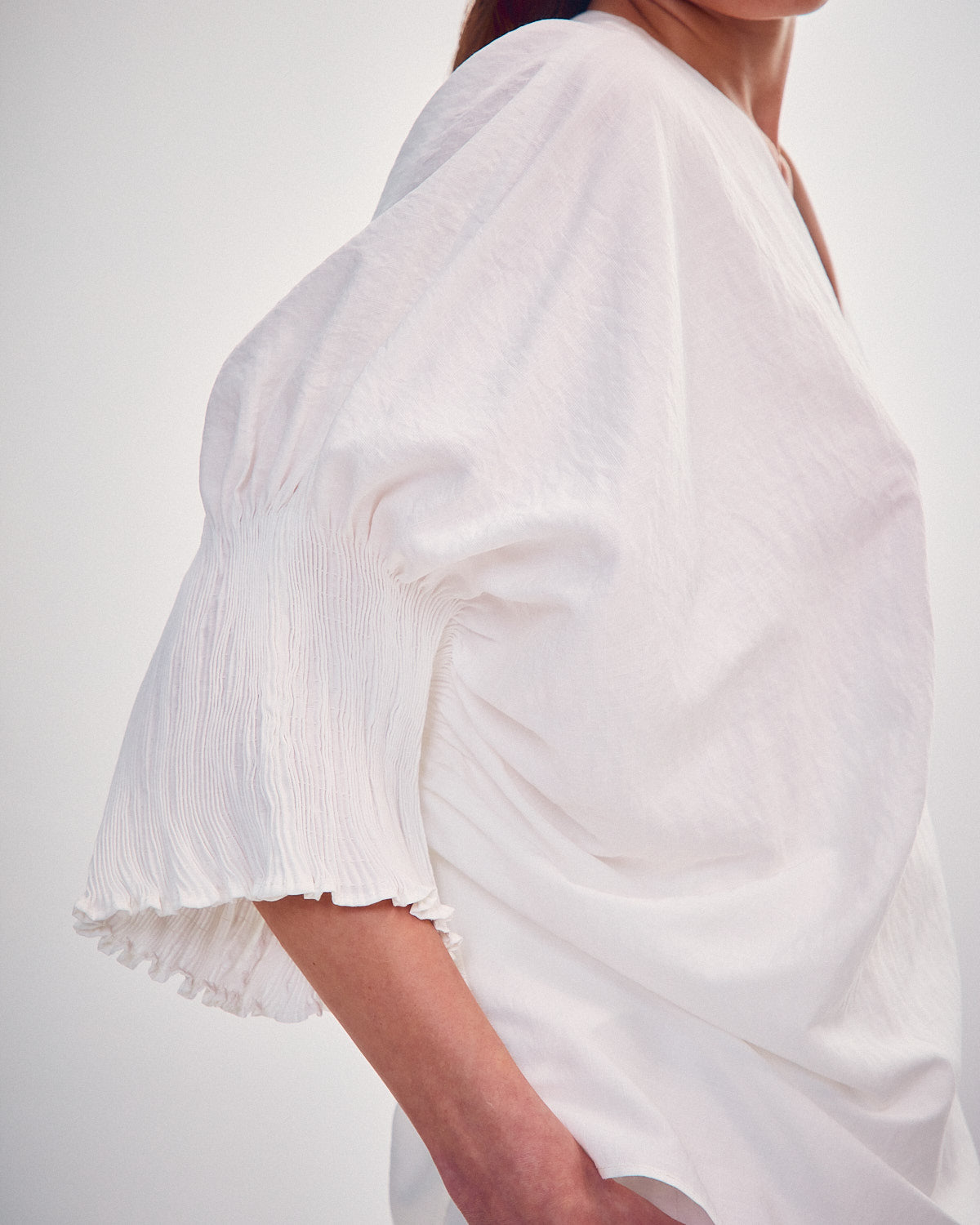 Blouse with tight sleeves