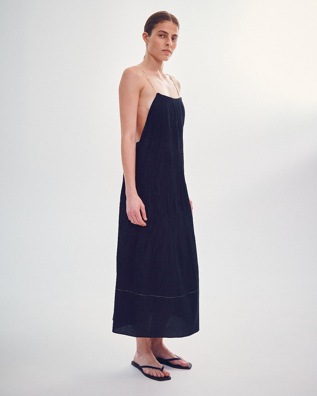 Handmade dress with gold knots