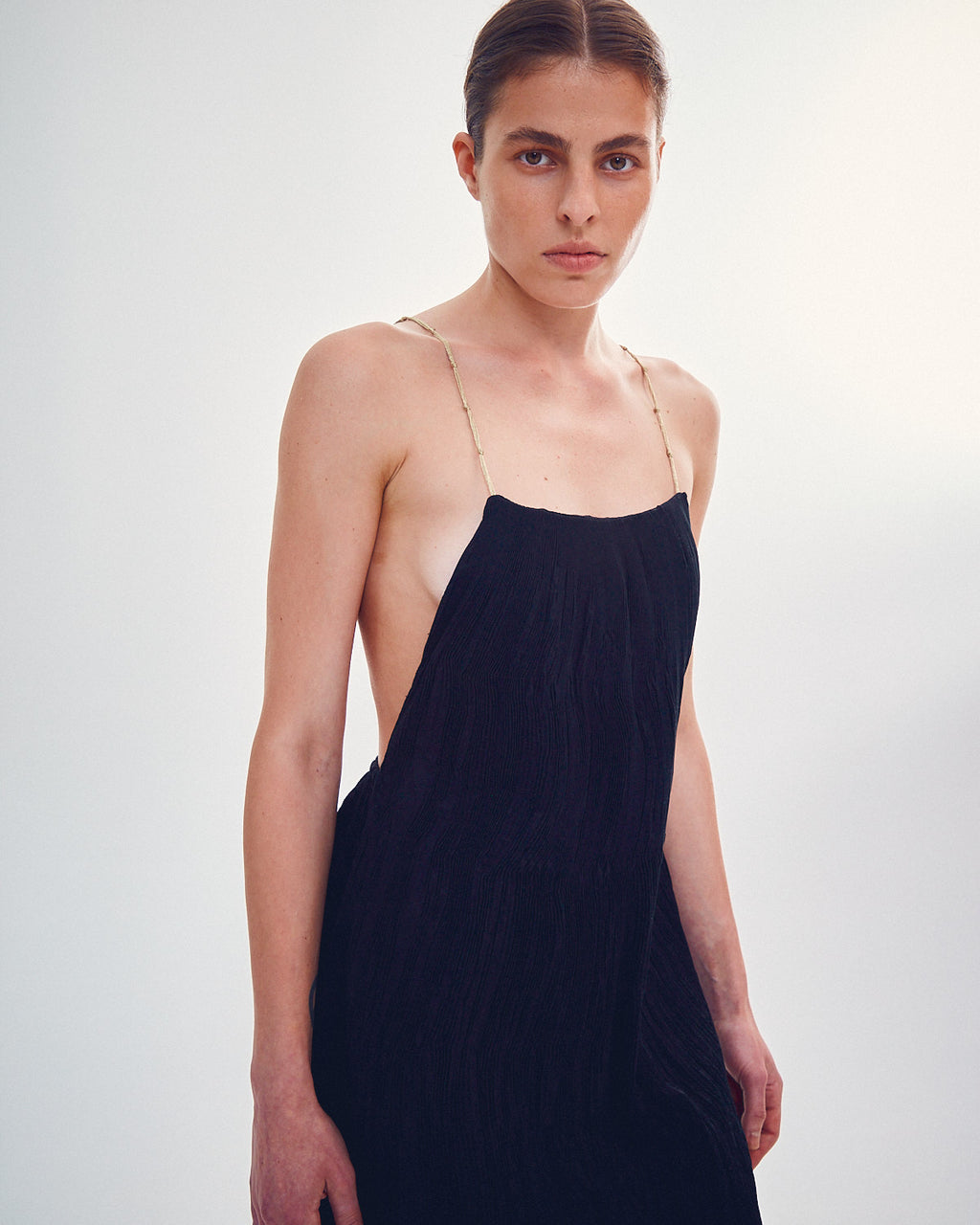 Handmade dress with gold knots