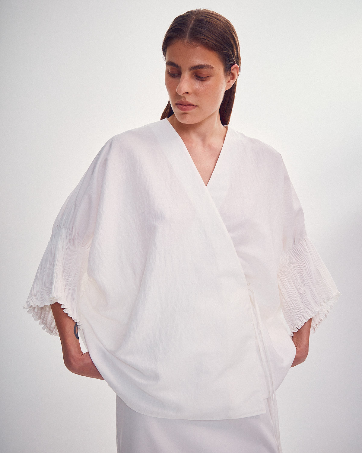 Blouse with tight sleeves