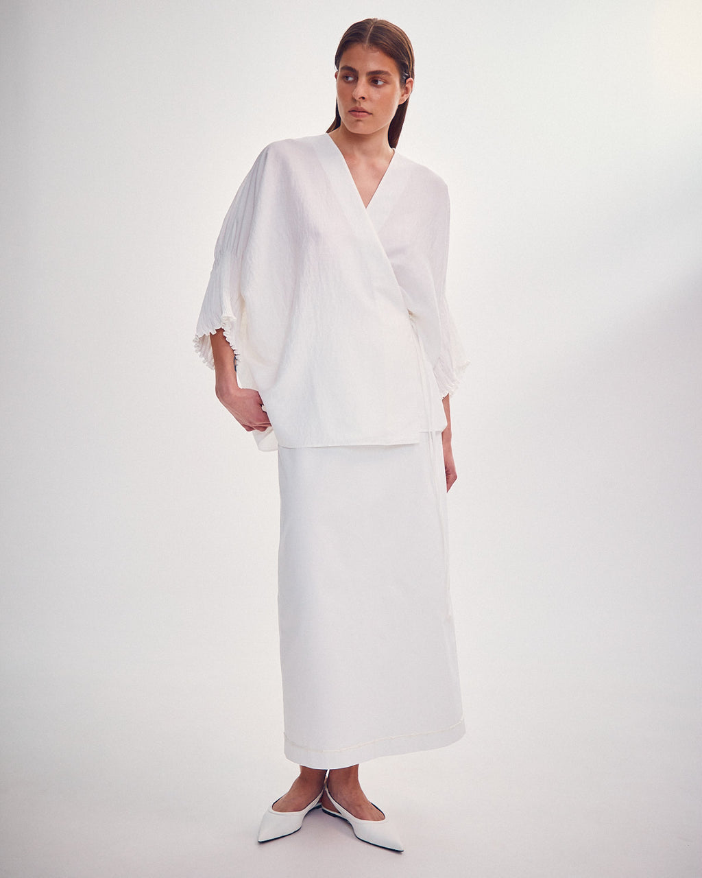 Blouse with tight sleeves