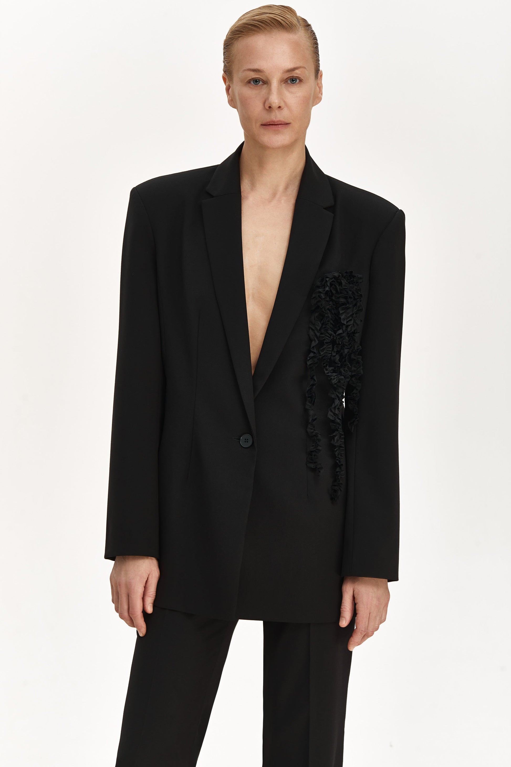 Jacket with brooch