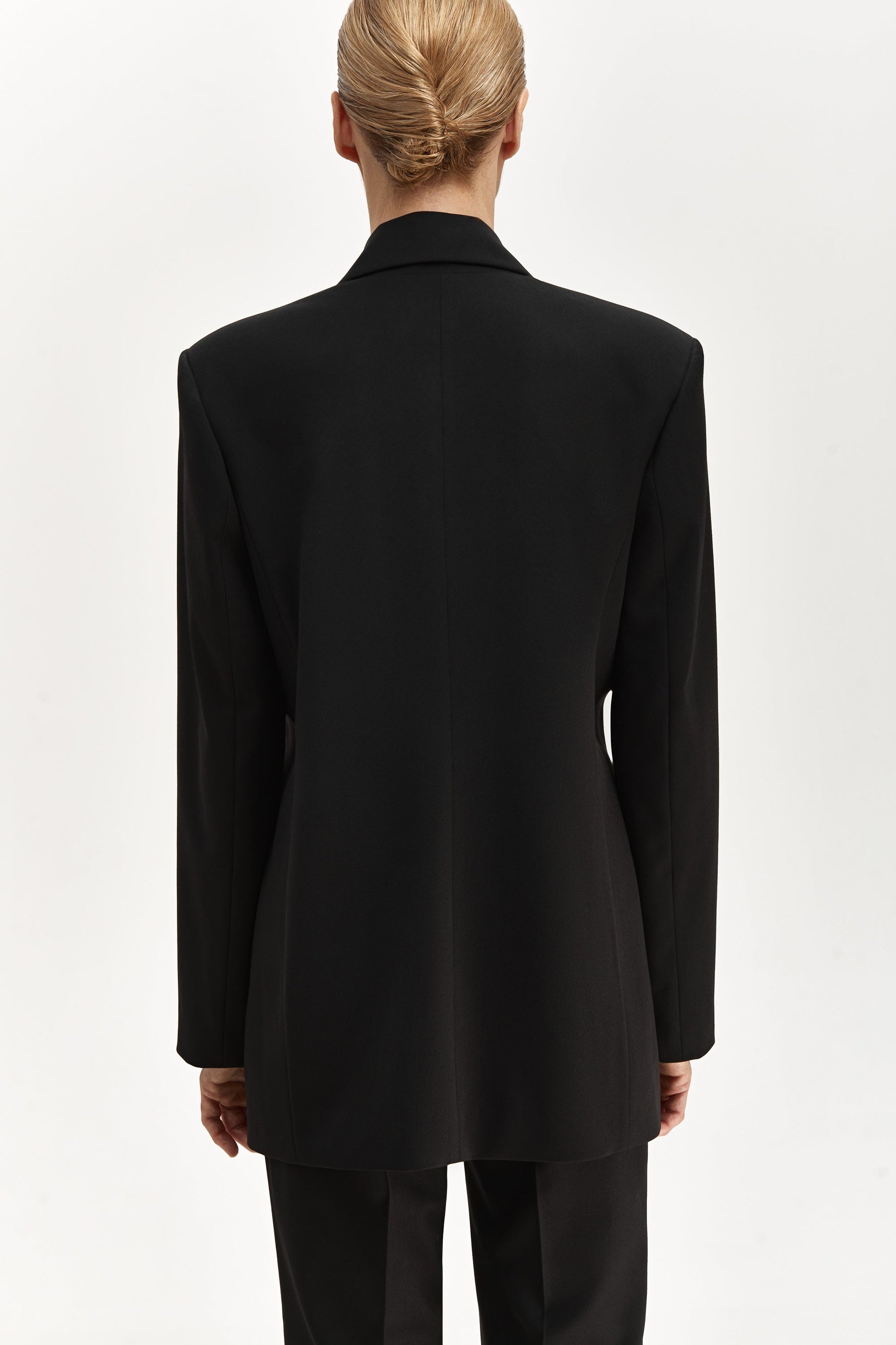 Jacket with brooch