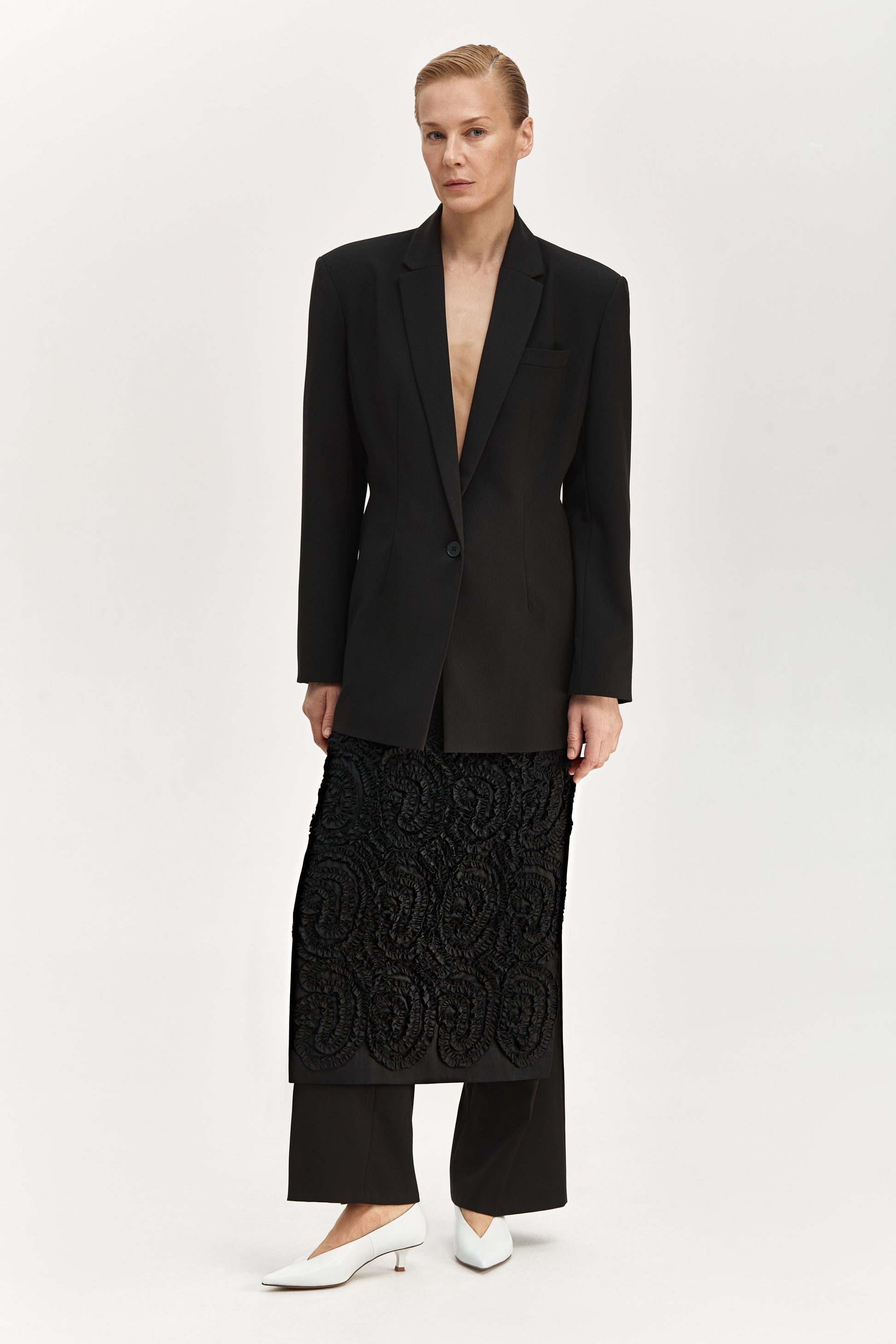 Jacket with brooch
