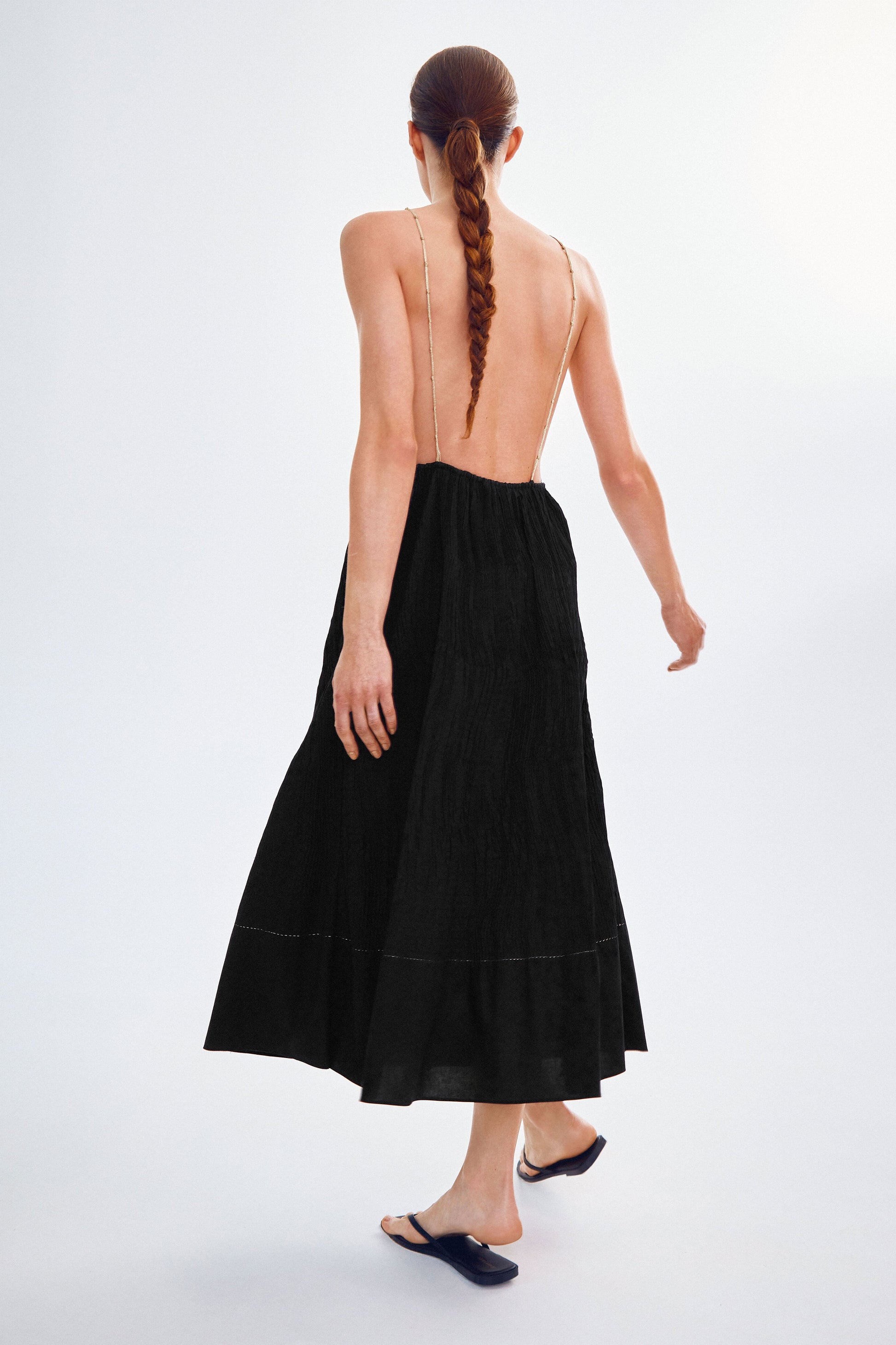 Handmade dress with gold knots