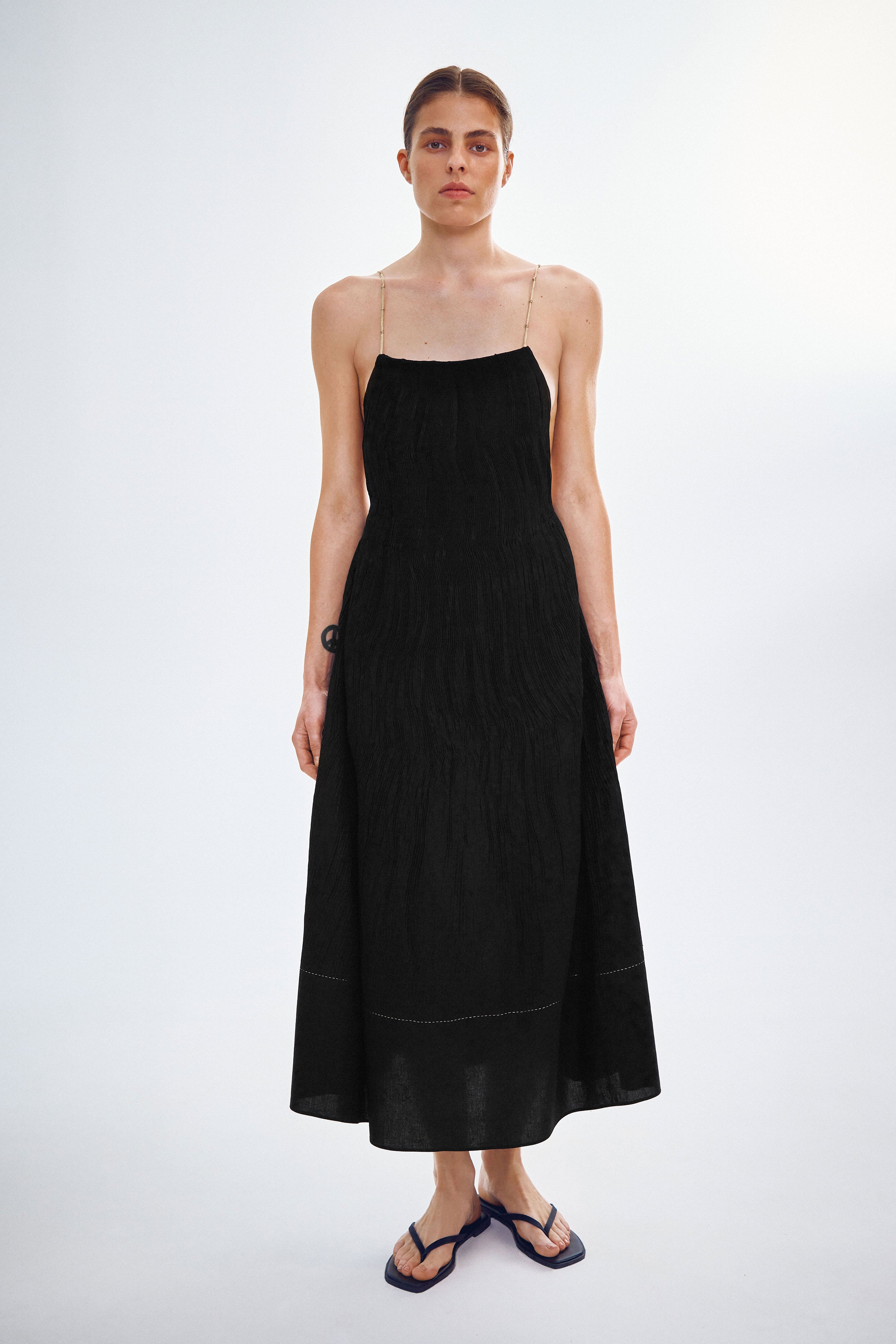 Handmade dress with gold knots