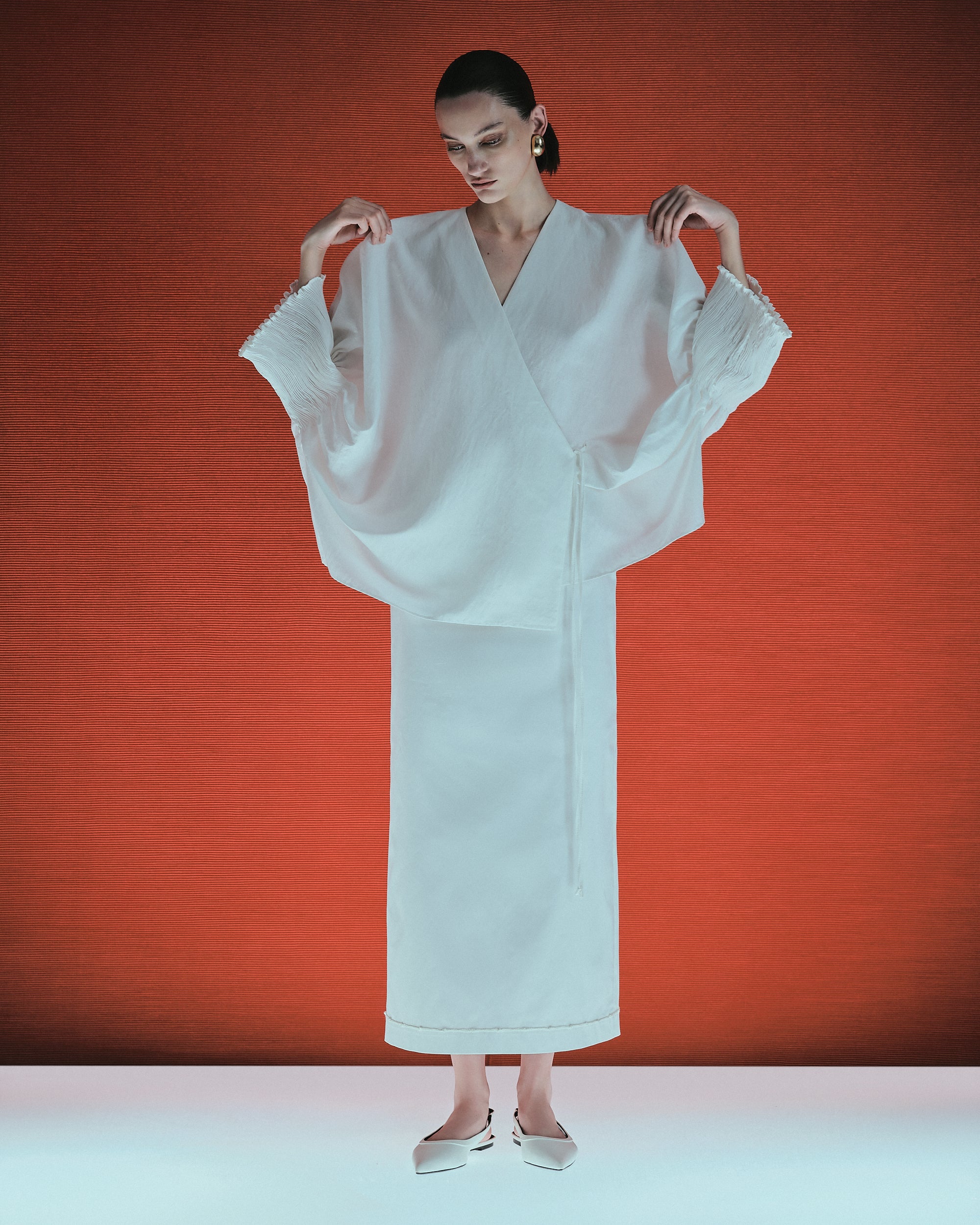 Blouse with tight sleeves