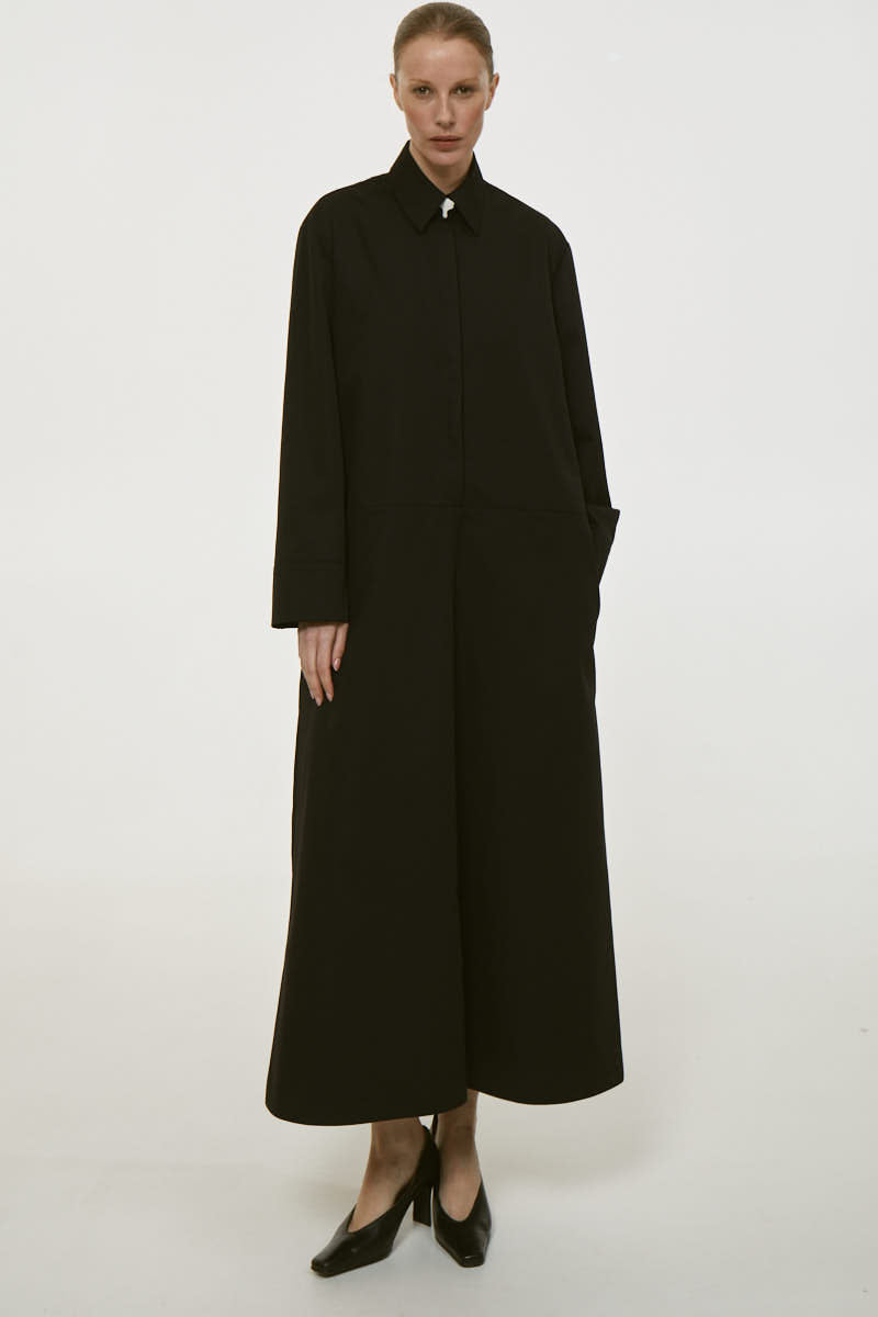Dress with parcel button